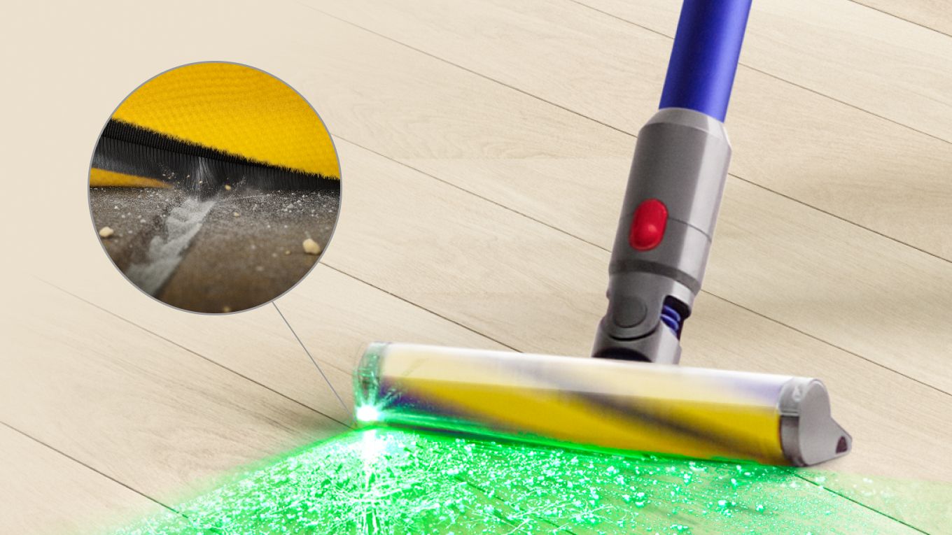 Low angle close-up of the Fluffy Optic cleaner head illuminating dust.