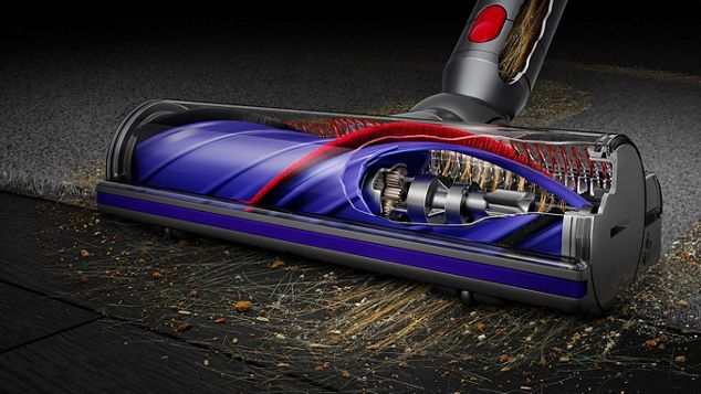 Low angle, close-up cutaway of the Motorbar cleaner head showing brush bar and hair removal vanes.