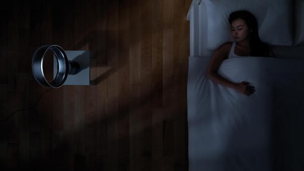 Dyson Pure Cool™ desk fan in bedroom with woman sleeping