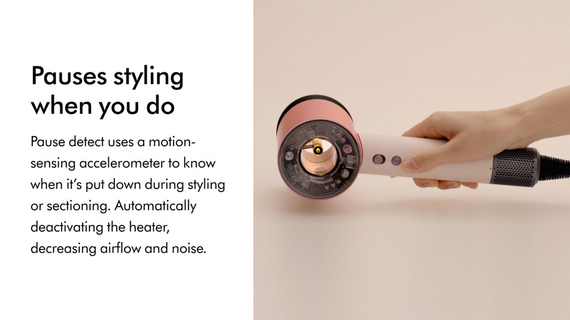 The Dyson Supersonic Nural hair dryer being set down demonstrating the pause detect feature