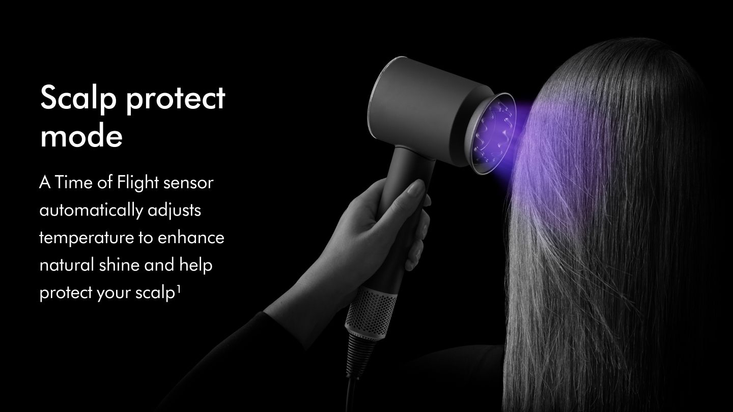 The Dyson Supersonic Nural hair dryer shown sensing the distance from a model's scalp.