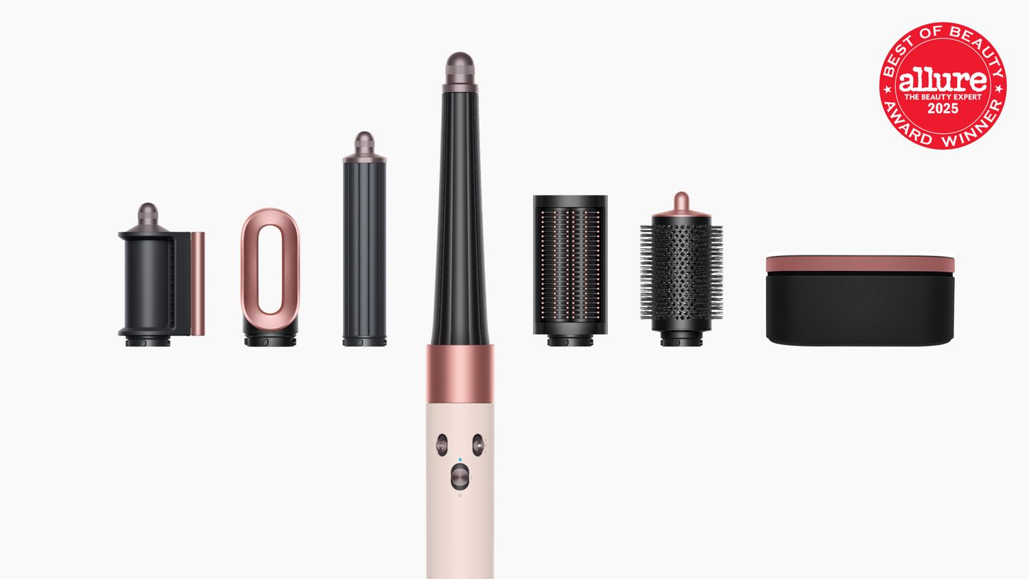 The Dyson Airwrap i.d. Straight + Wavy with all its attachments by its side