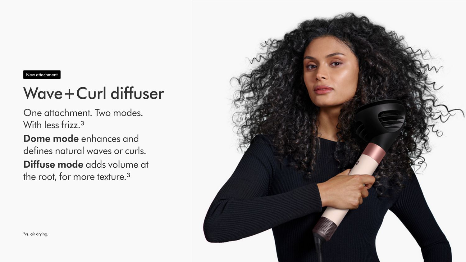 Model holding the Dyson Airwrap ID multi-styler and dryer with the Diffuser.