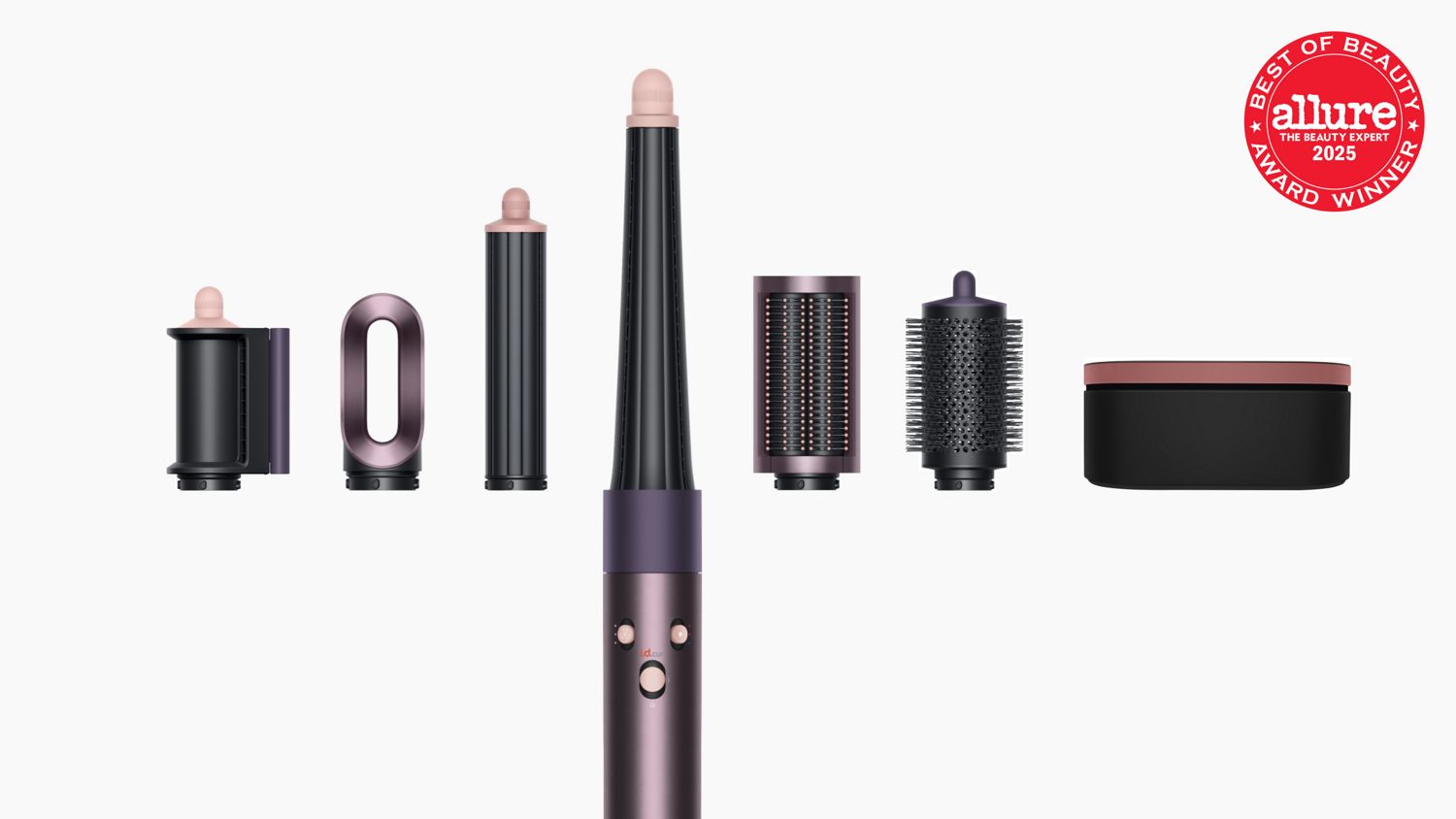 The Dyson Airwrap i.d. Straight + Wavy with all its attachments by its side