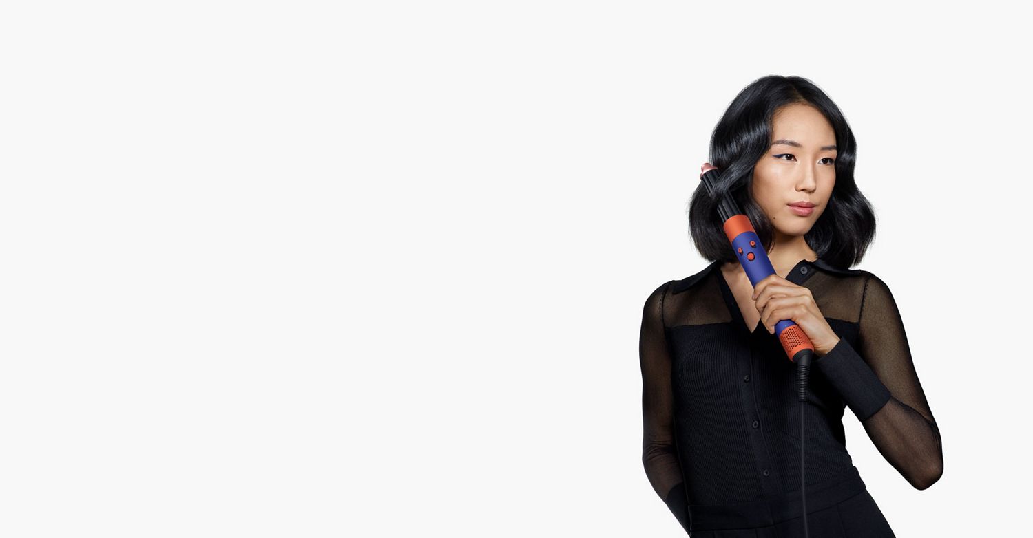 Model using the Airwrap i.d. multi-styler and dryer.