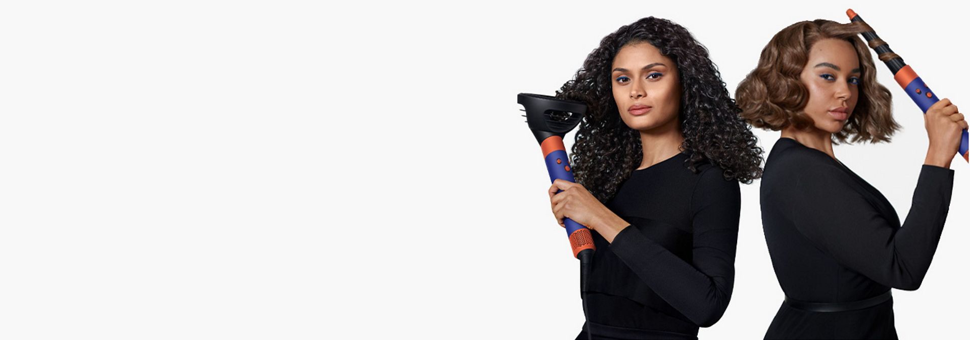 Two models use Dyson Airwrap i.d. multi-styler and dryers to achieve different hair styles.