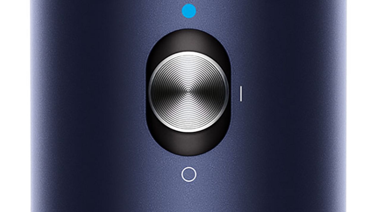 Close do botão de injeção fria no Dyson Airwrap Close do botão de injeção fria no Dyson Airwrap
