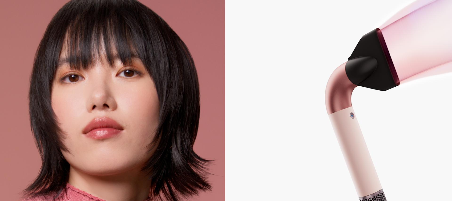 Model and Dyson Supersonic r hair dryer