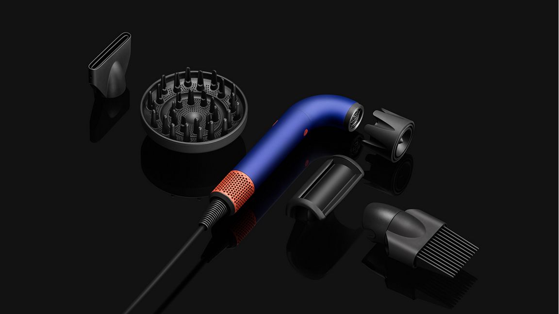 Dyson Supersonic r hair dryer with the five attachments.