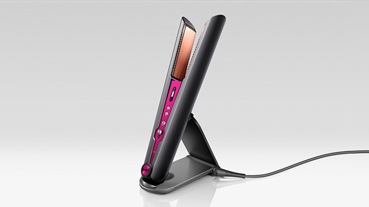 Dyson Corrale straightener placed in the charging dock.