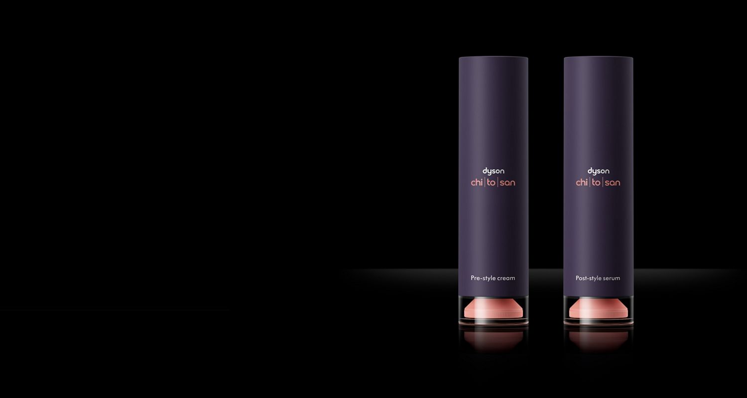 Dyson Chitosan Pre-style cream and Post-style serum pump-bottles.