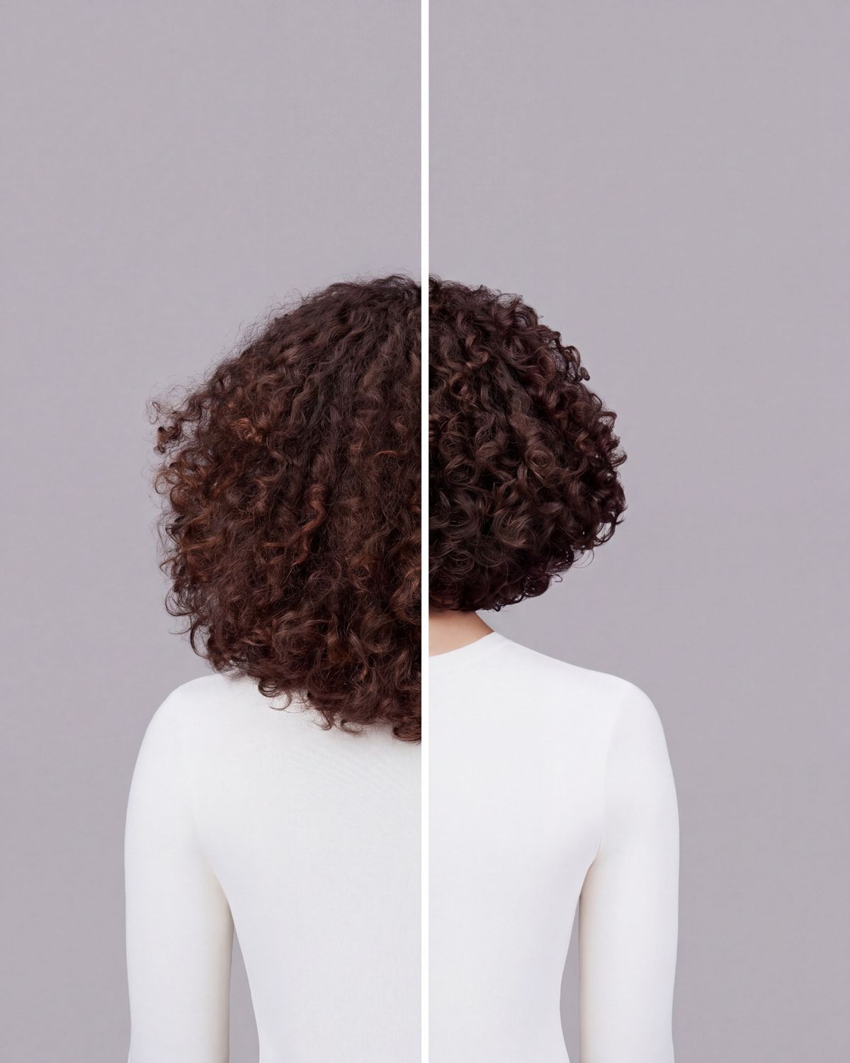 Naturally curly dark brown hair styled with Dyson Chitosan Pre-style cream and the Dyson Supersonic r. Seen from behind.