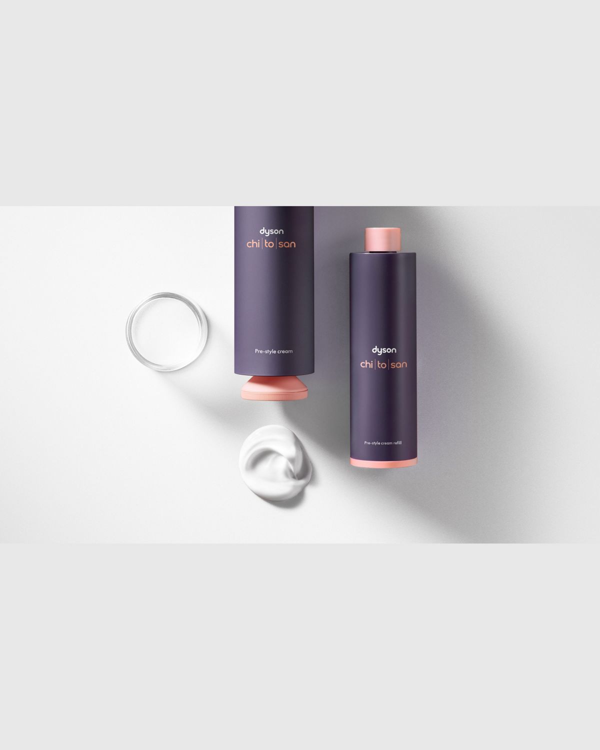 The Dyson Chitosan Pre-style cream full-size product next to a refill cartridge.