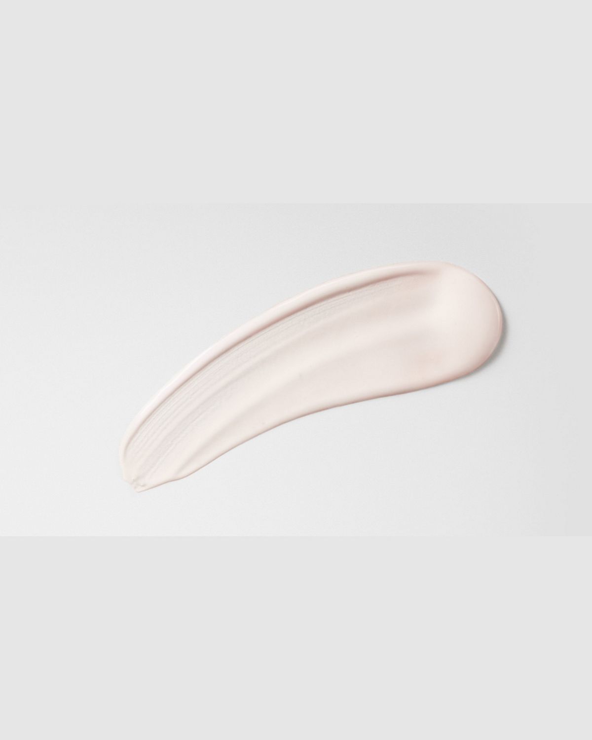 Dyson Chitosan Post-style serum spread on a surface.