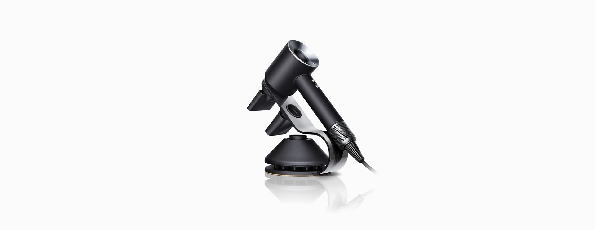 Nickel and Black Dyson Supersonic™ hair dryer stand with Supersonic hairdryer