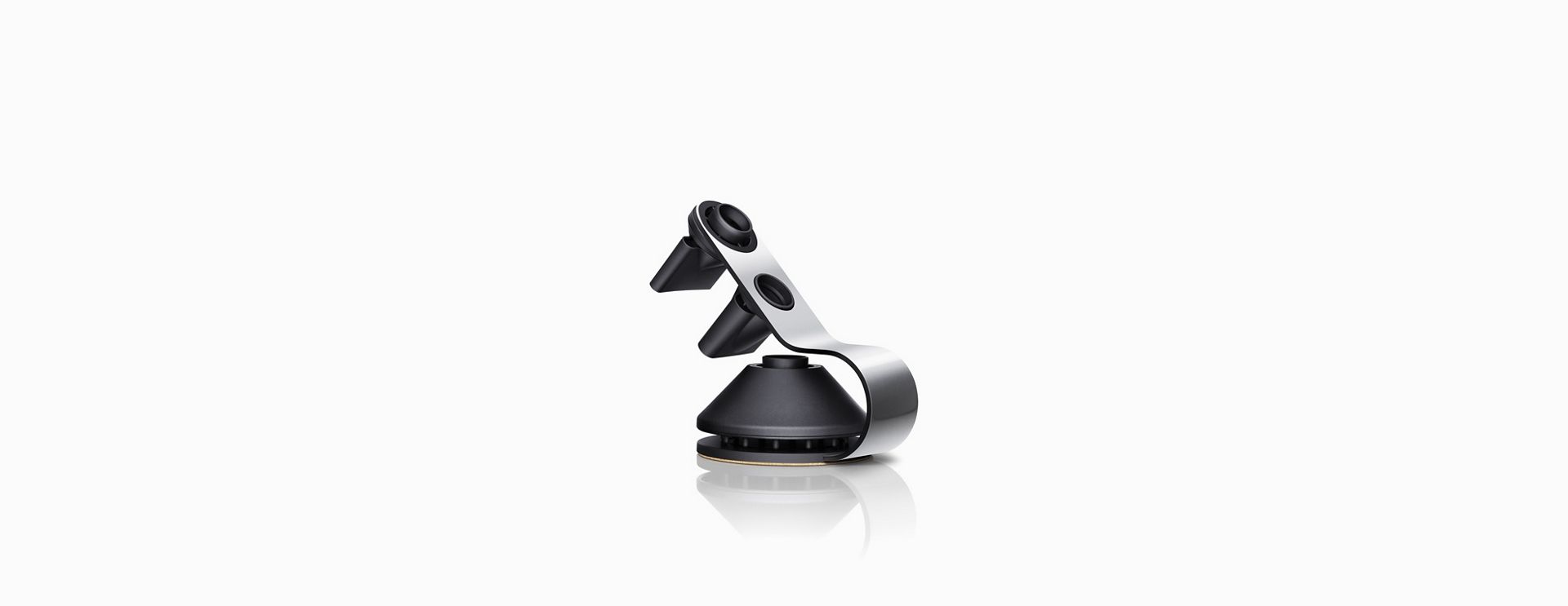Nickel and Black Dyson Supersonic™ hair dryer stand with attachments
