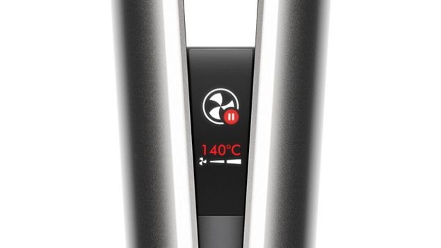 Close-up of the Dyson Airstrait LCD screen, showing the auto-pause animation.