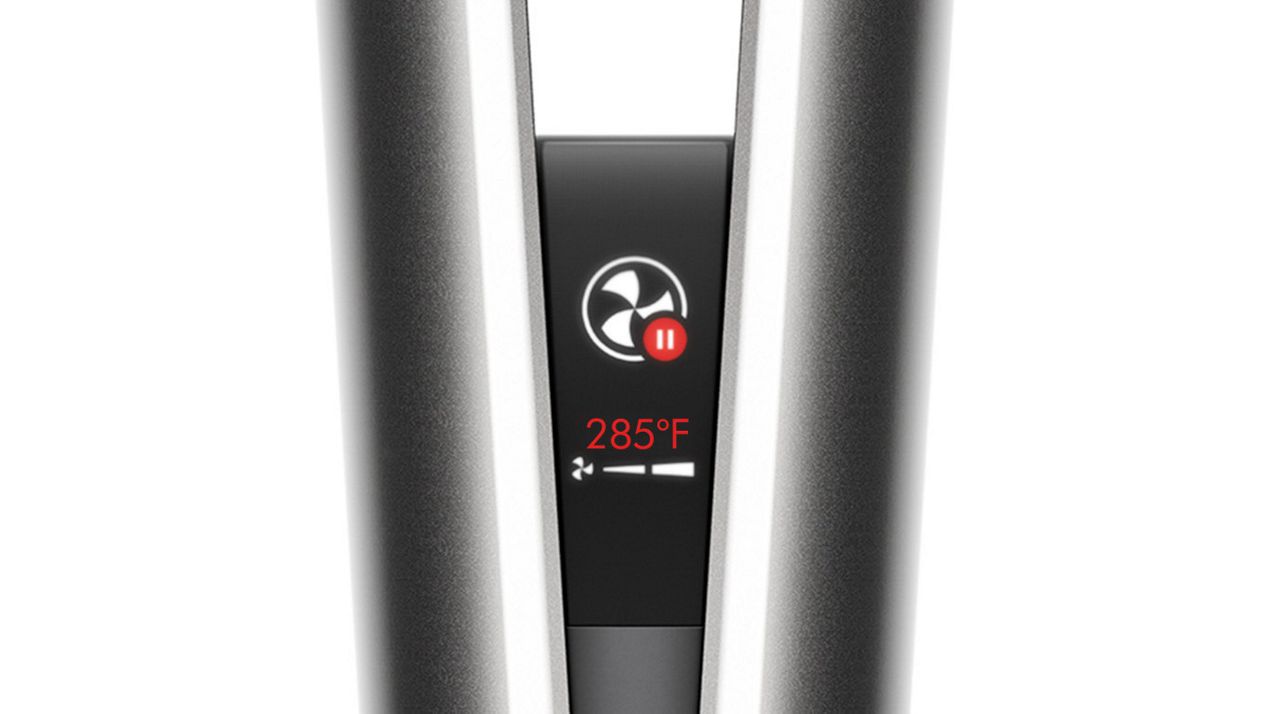 The Dyson Airstrait LCD screen, showing the auto-pause animation.