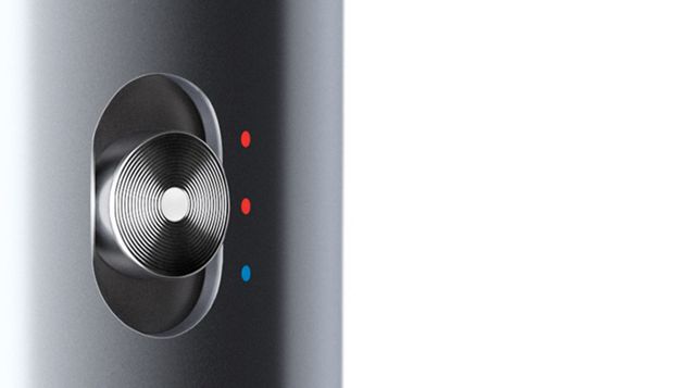 Close up of hair being gathered by the flexing plates on the Dyson Corrale hair straightener