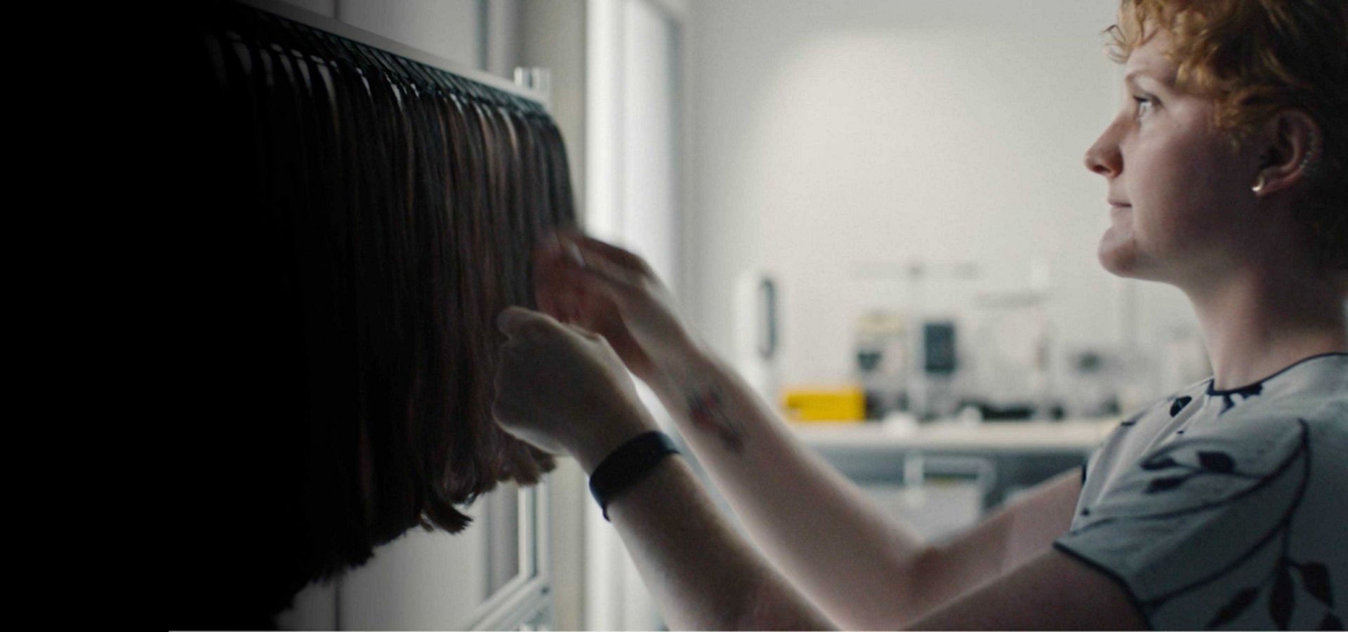 Hair scientist working on tresses in a lab