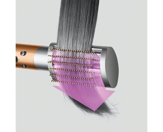 髪をなめらかにするDyson Airwrapマルチスタイラーとスムージングブラシと、下方向を示す矢印