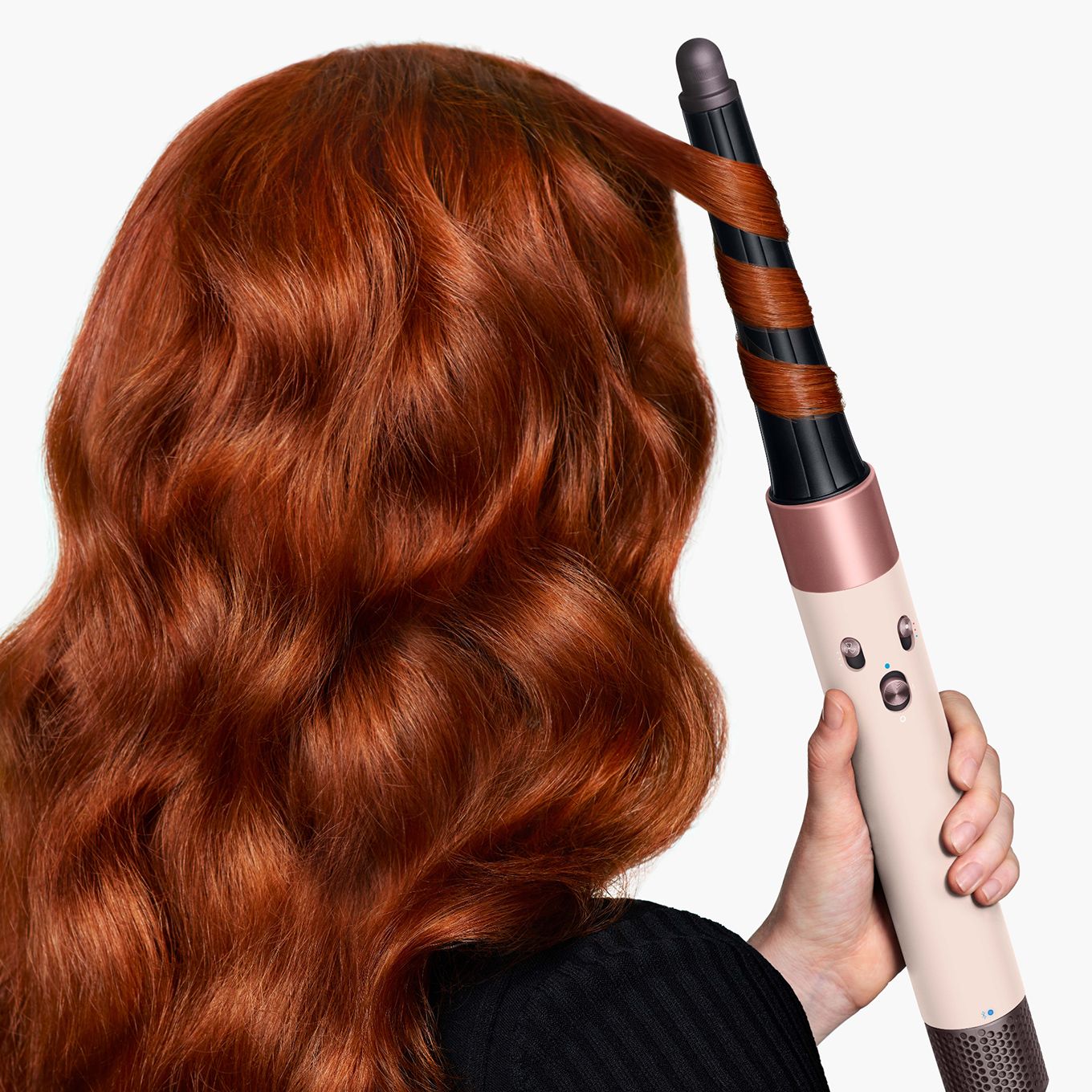 Airwrap i.d.™ curling hair on a red-haired model