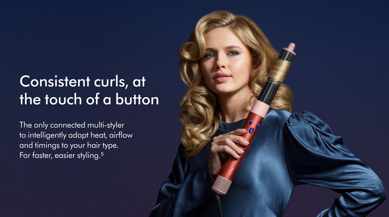 Woman curling hair with the Dyson Airwrap ID multi-styler. 