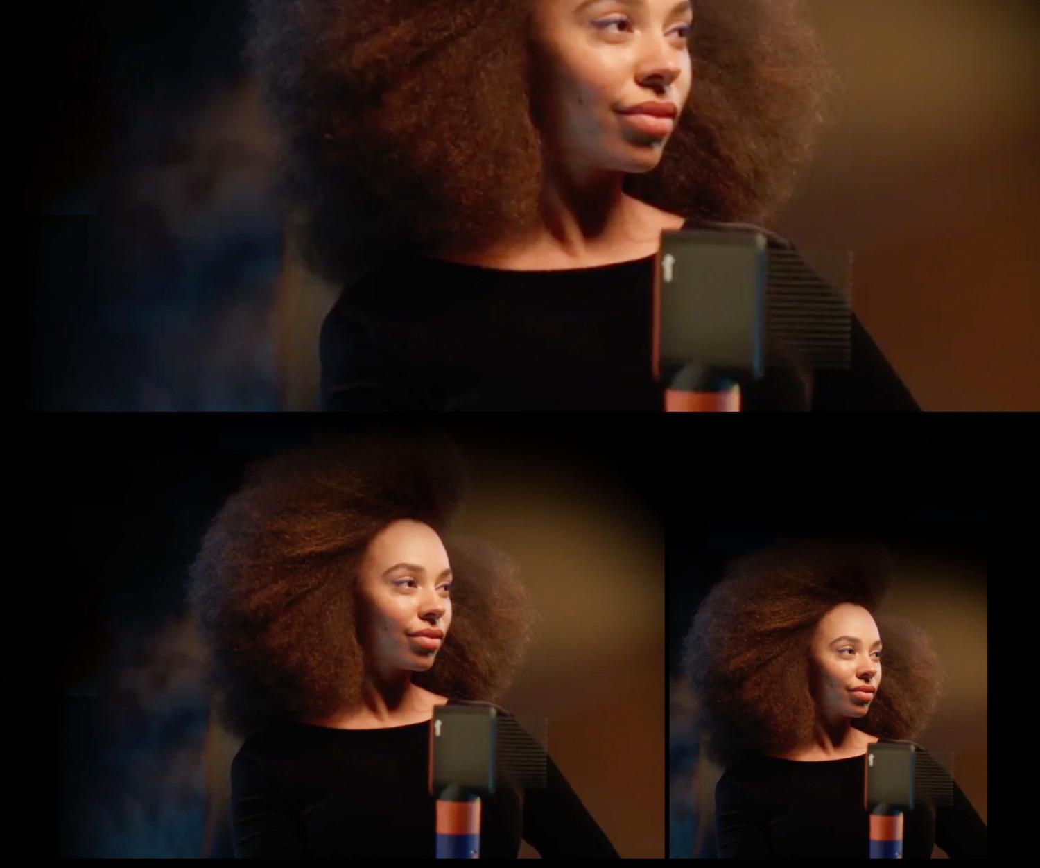 Model holding an Airwrap i.d. multi-styler and dryer.