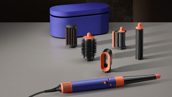 The Vinca Blue Dyson Airwrap i.d multi-styler and dryer and range of attachments.