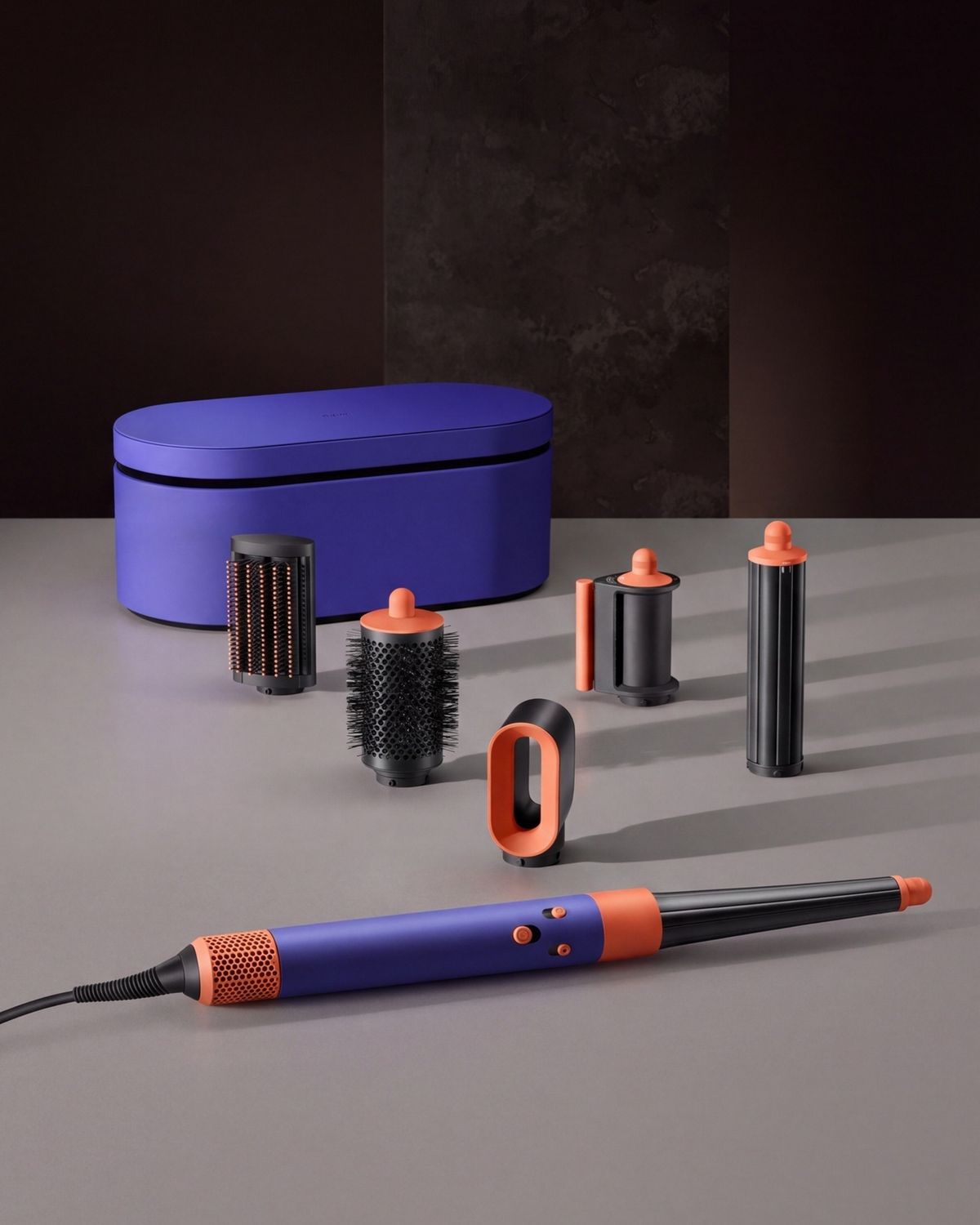 The Vinca Blue Dyson Airwrap i.d multi-styler and dryer and range of attachments.