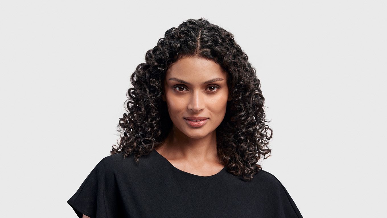 Model with hair in glossy ribbons. Model with hair in glossy ribbons.