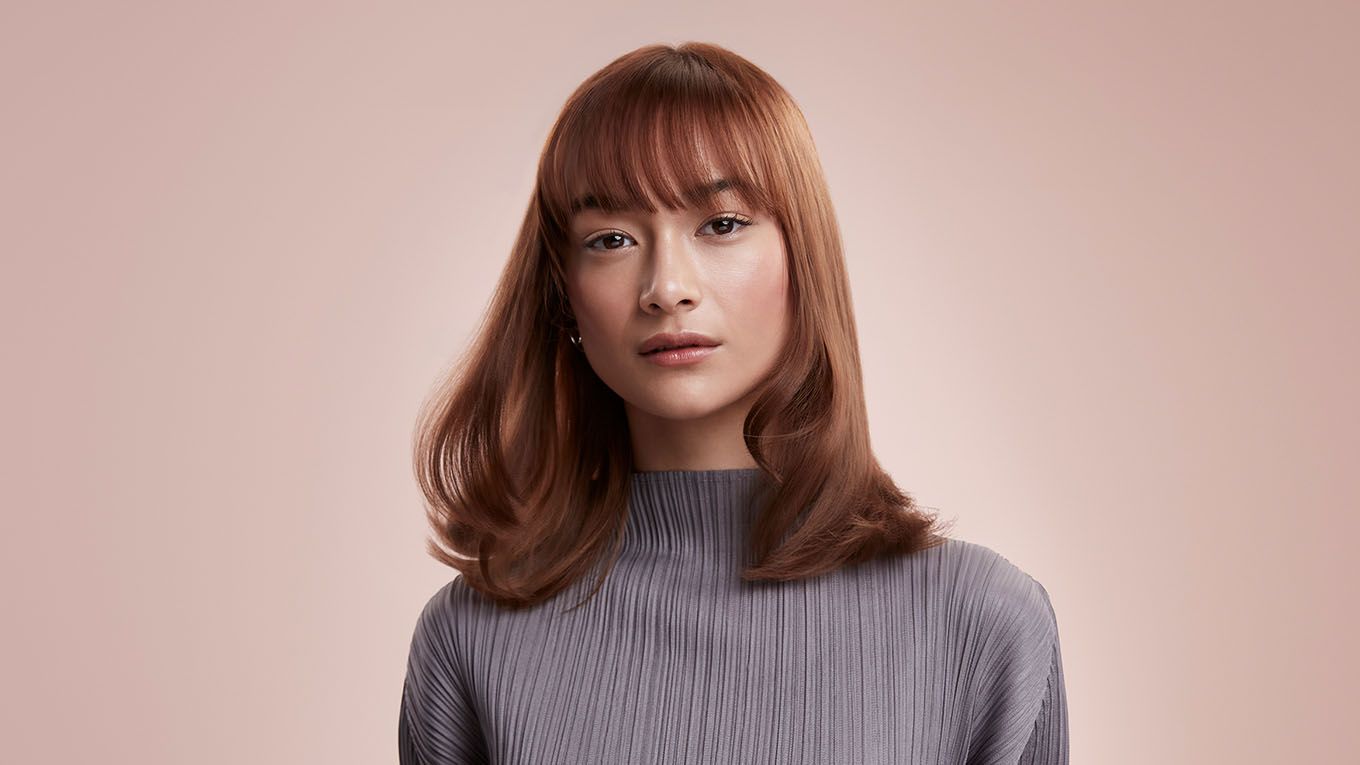 Everyday blow dry Images of models with finished styles.