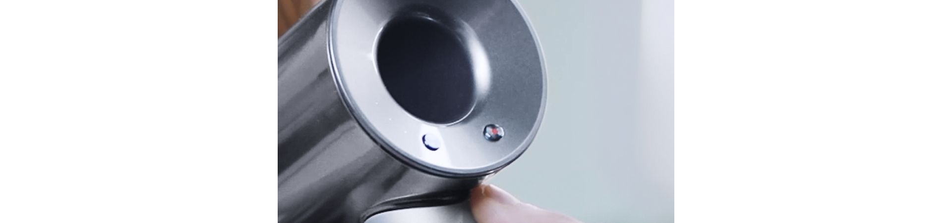 Close-up of hair dryer and intelligent heat control 