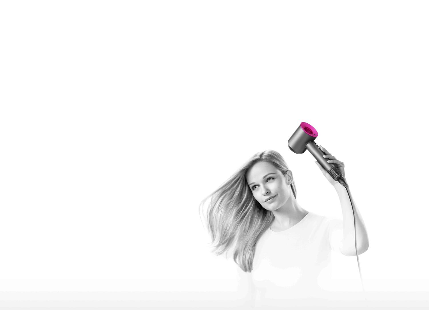 Model with Dyson Supersonic™ hair dryer