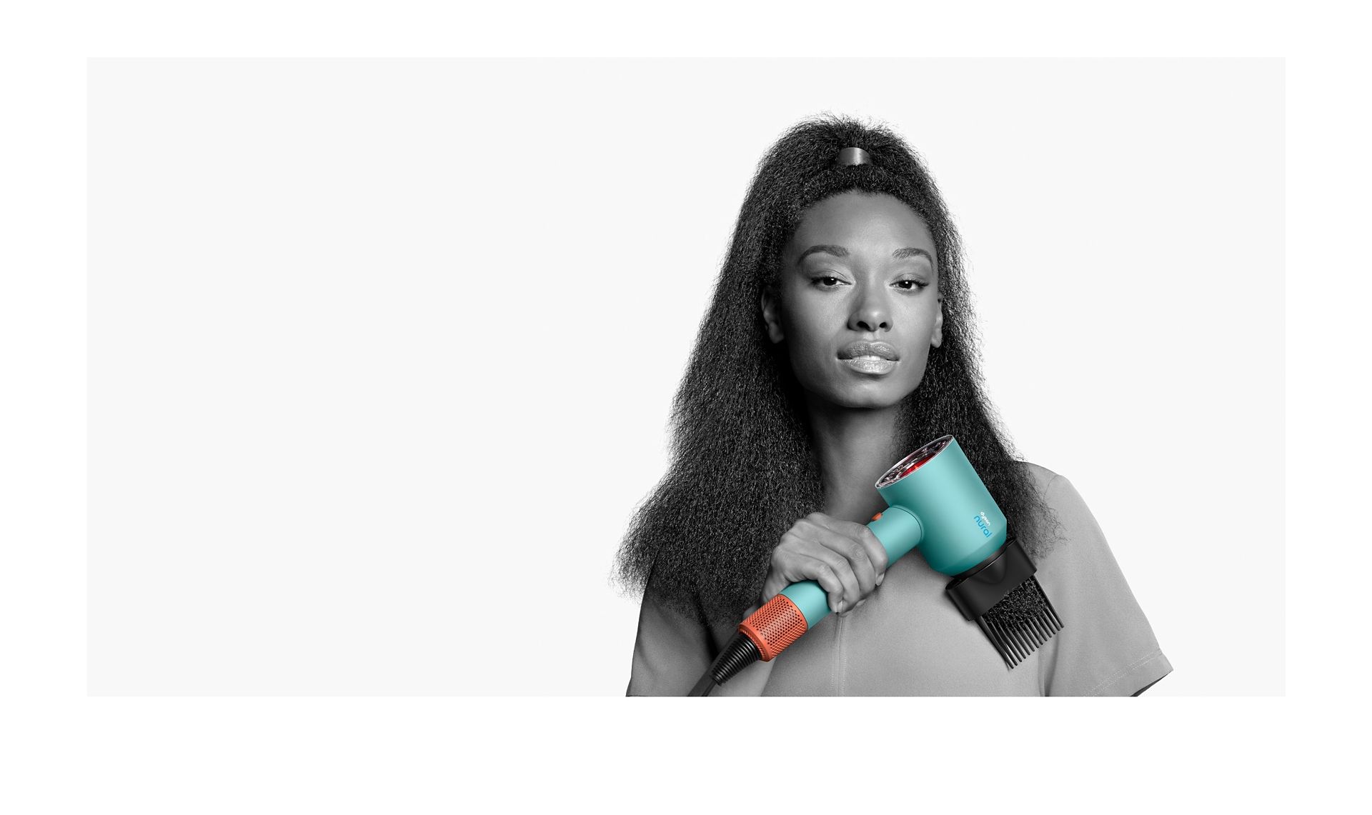 Female model using the Wide-tooth comb