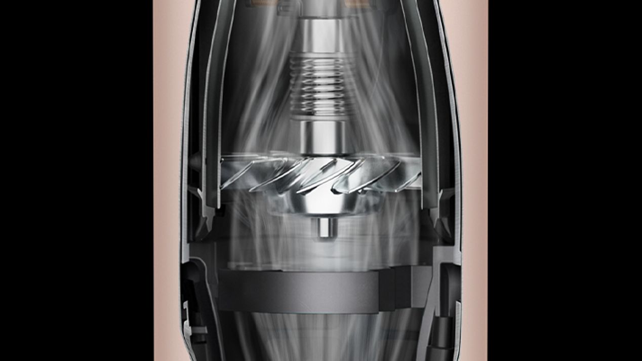 Ein Bild mit der Technologie des Motors im Inneren des Griffs des Dyson Supersonic Nural Haartrockners. Ein Bild mit der Technologie des Motors im Inneren des Griffs des Dyson Supersonic Nural Haartrockners.