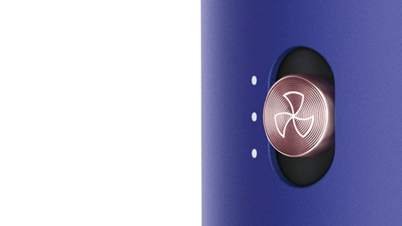Airflow button on Dyson Airwrap Close-up of airflow button on Dyson Airwrap