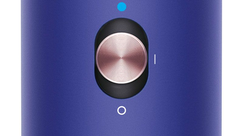 Cold shot button on Dyson Airwrap Close-up of cold shot button on Dyson Airwrap