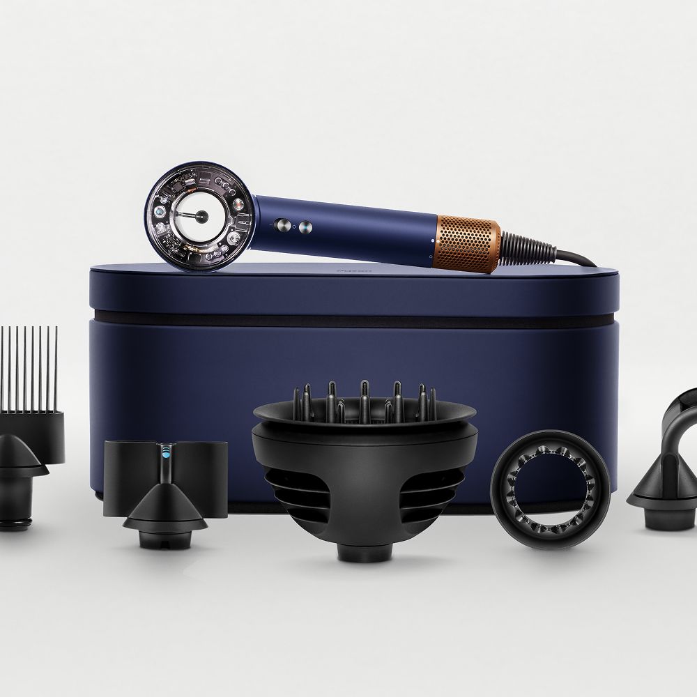 The Dyson Supersonic Nural hair dryer with a range of attachments.