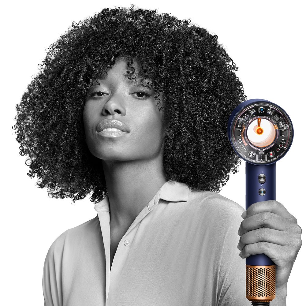 The Dyson Supersonic Nural hair dryer with a range of attachments.