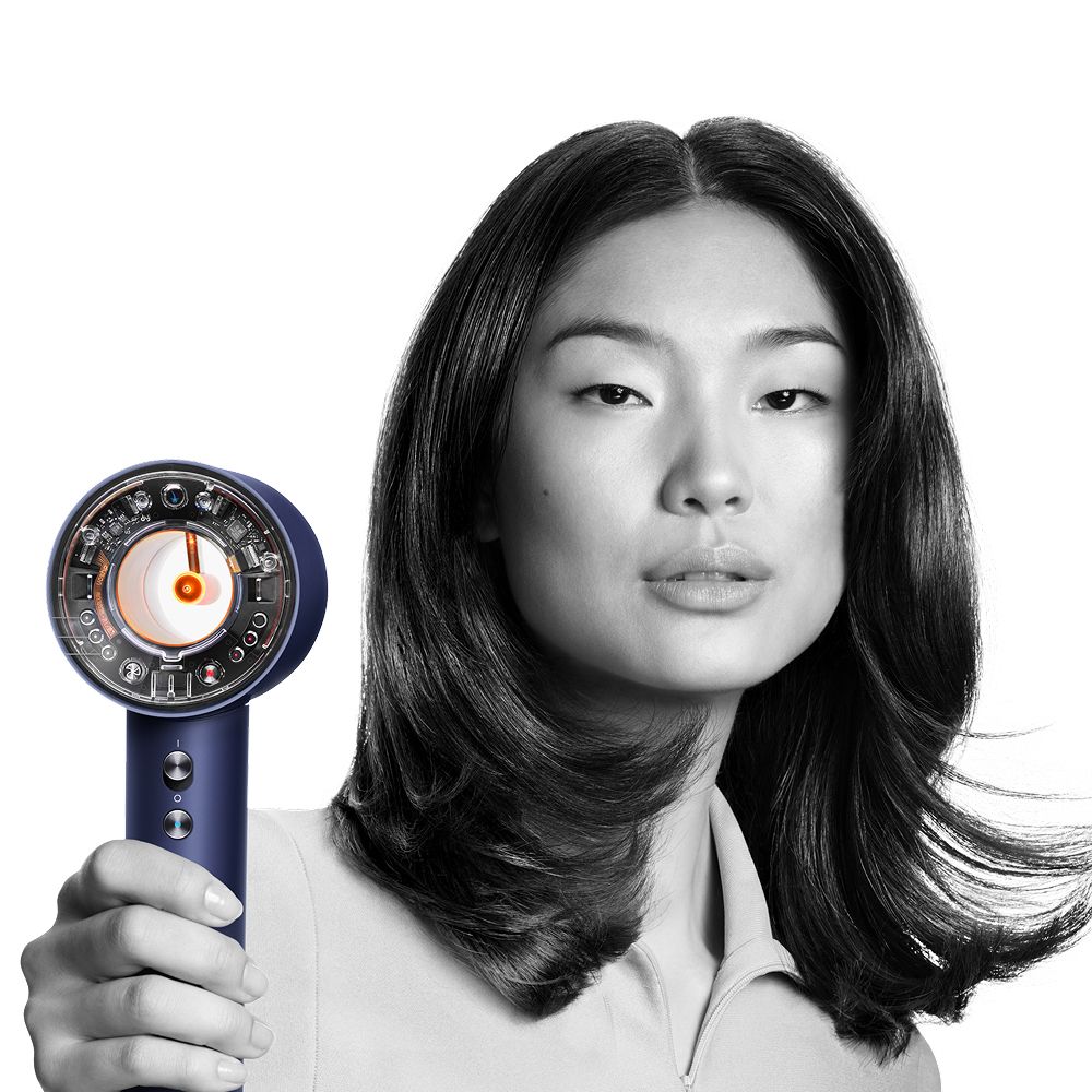 The Dyson Supersonic Nural hair dryer with a range of attachments.