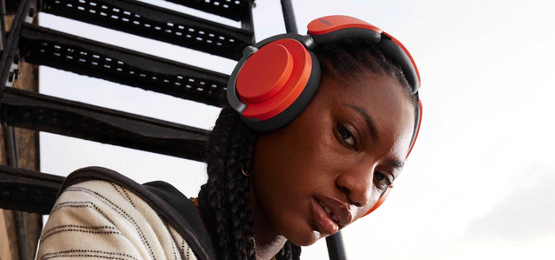A model wearing the Dyson OnTrac headphones.