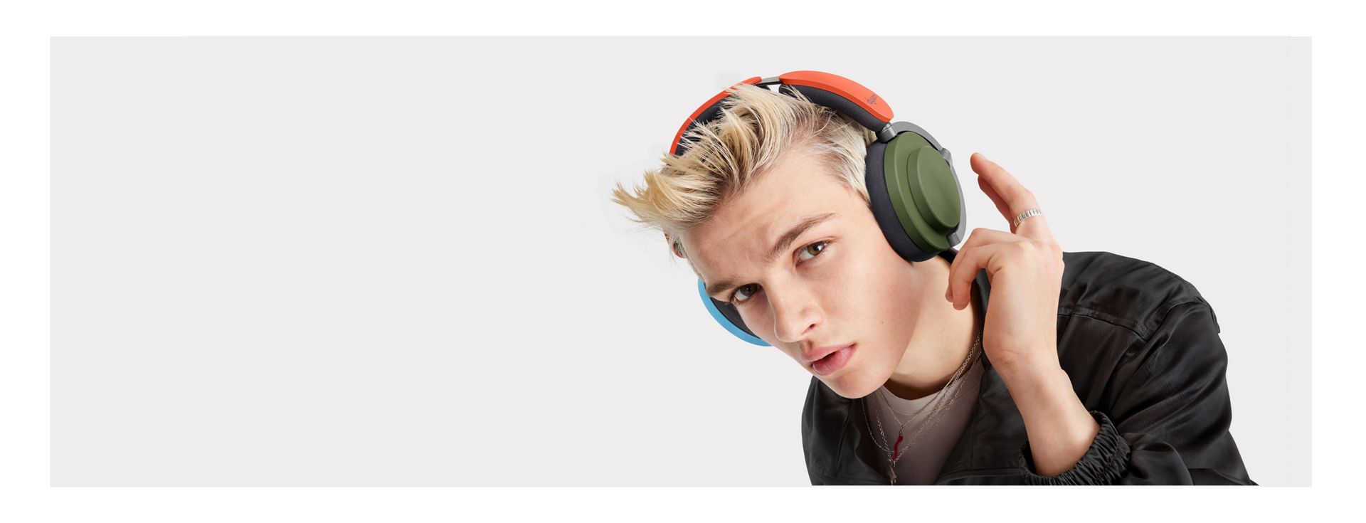 A model wearing the Dyson OnTrac headphones.