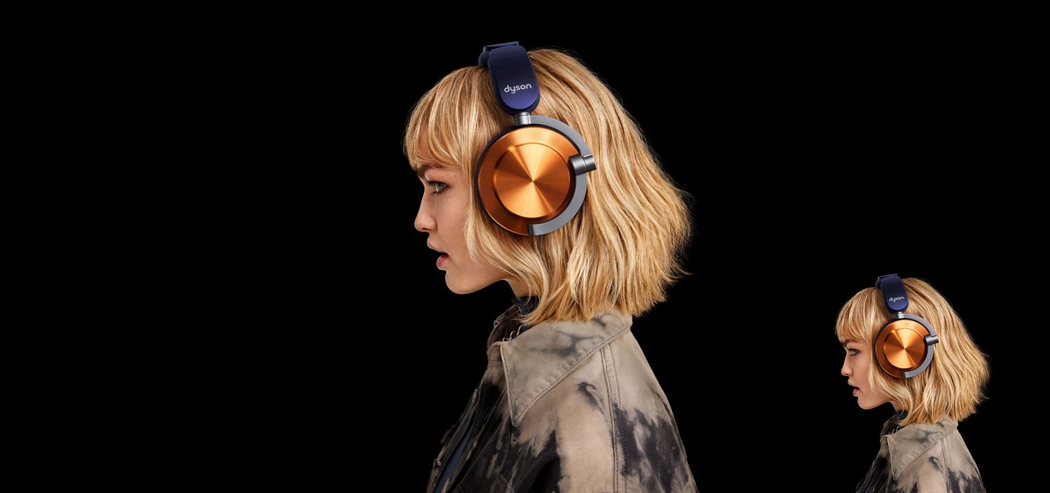 Model wearing Dyson OnTrac headphones.