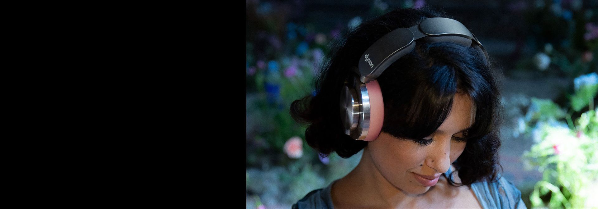 RAYE wearing Dyson OnTrac headphones.