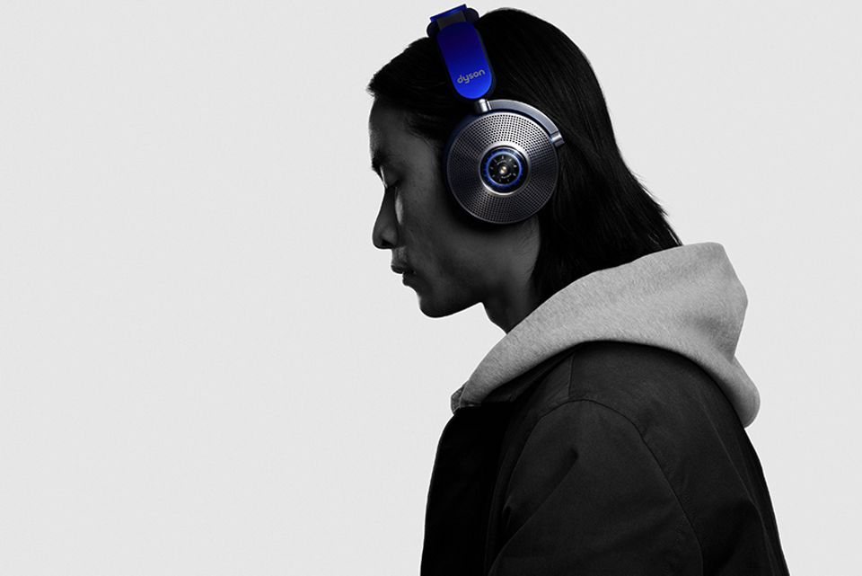 Man wearing Dyson Zone headphones