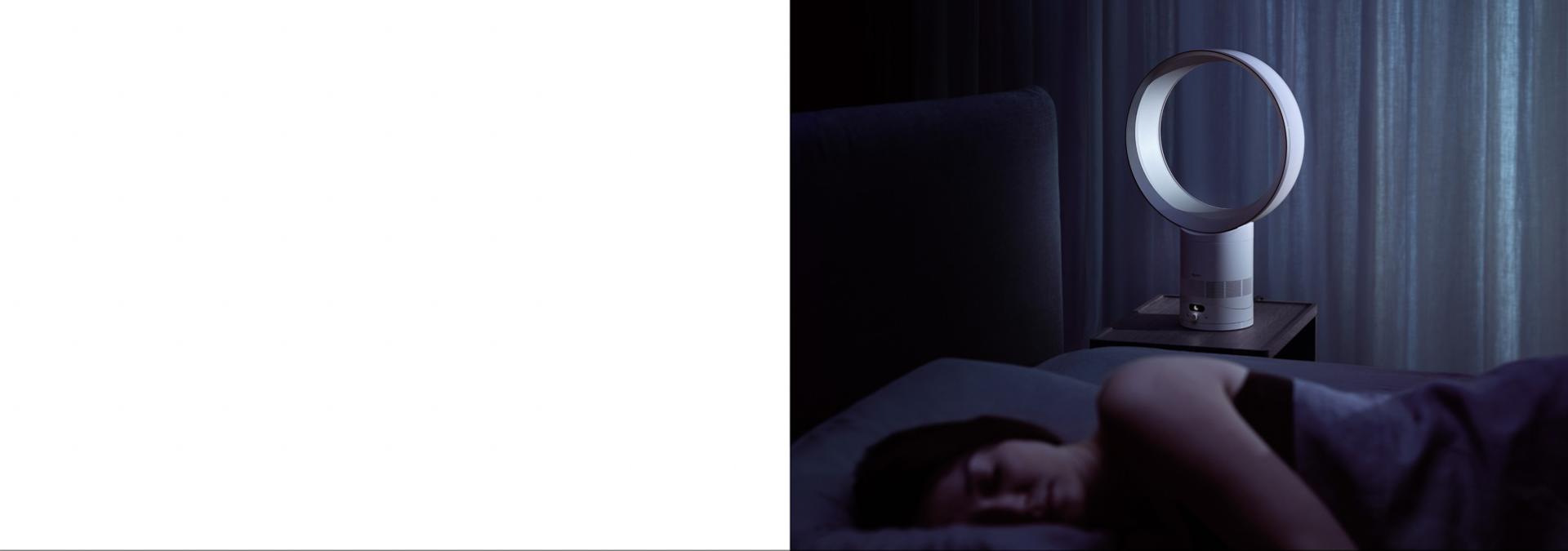The Dyson Cool CF1 fan cooling a person as they sleep.