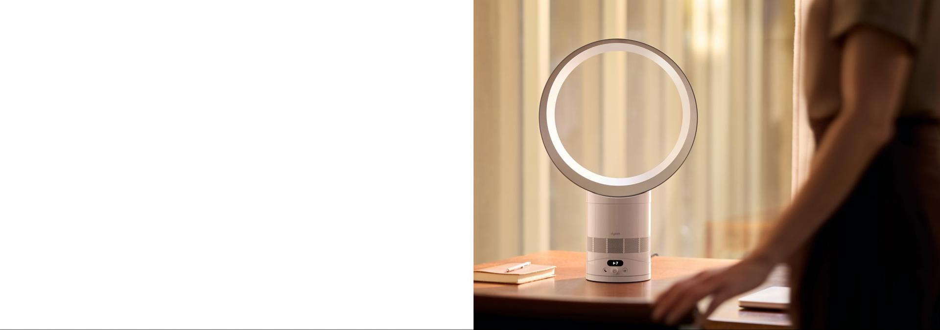 The Dyson Cool CF1 fan on the desk of a home office.