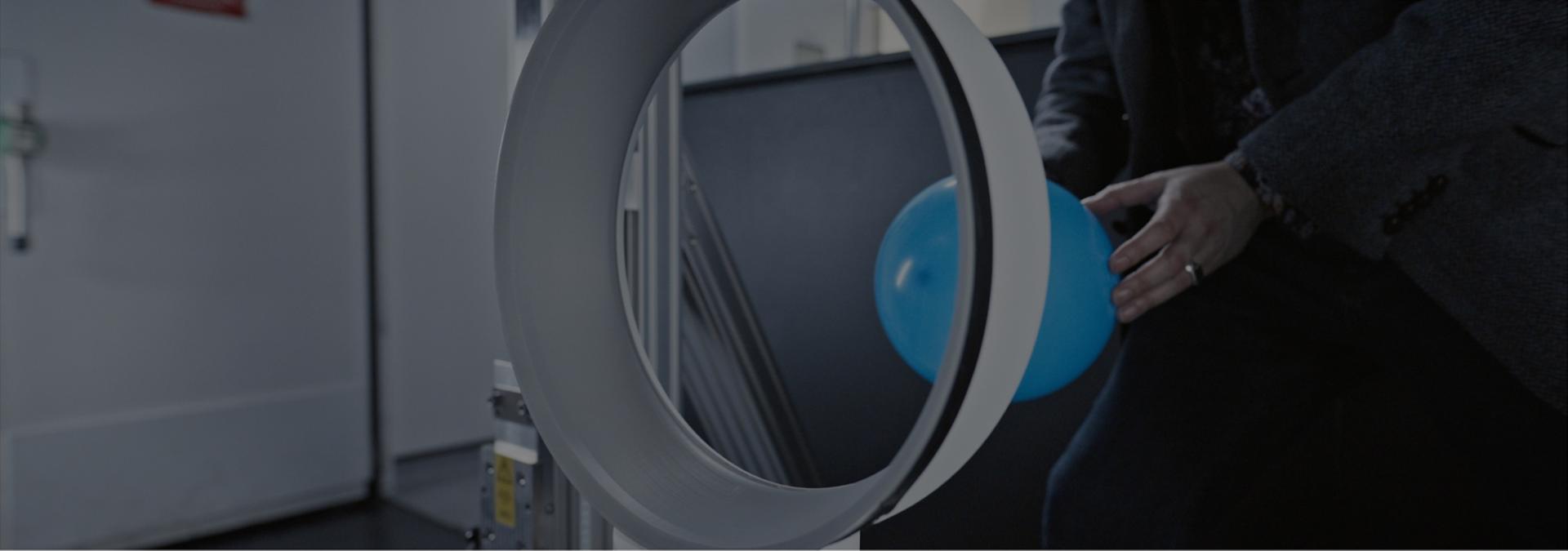 A balloon is passed through the loop amplifier of the Dyson Cool CF1 fan.