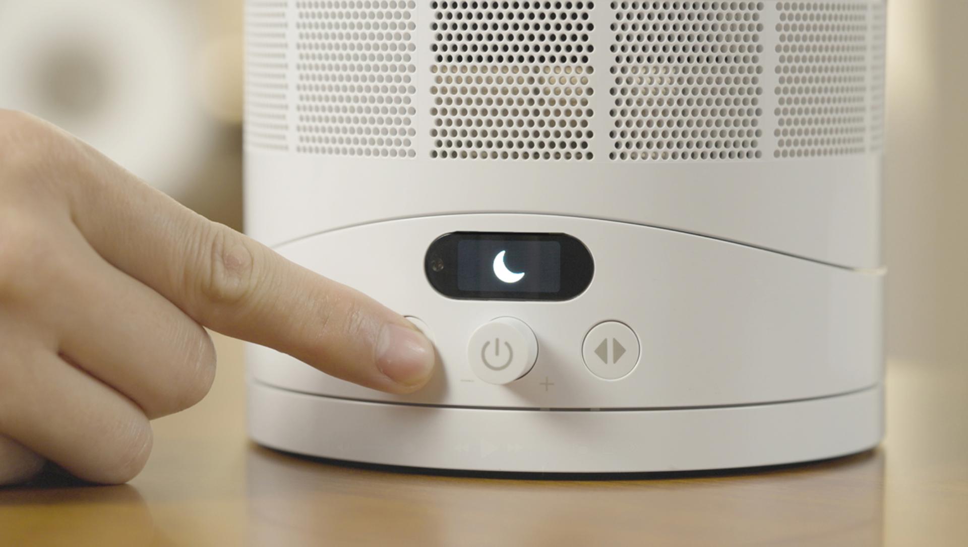 Sleep mode is activated on the Dyson Cool CF1 fan using the button on the base of the fan.